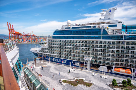 Vancouver, British Columbia, Canada - July 24, 2022: Cruise ship Celebrity Eclipse docked at Canada Place in the Port of Vancouver during peak cruise ship season.のeditorial素材