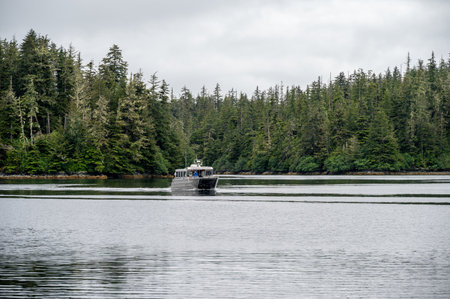 Sitka, Alaska - July 26, 2022 - View of Adventure Sitka's  Siginaka Explorer cruise boat picking up kayakers.のeditorial素材