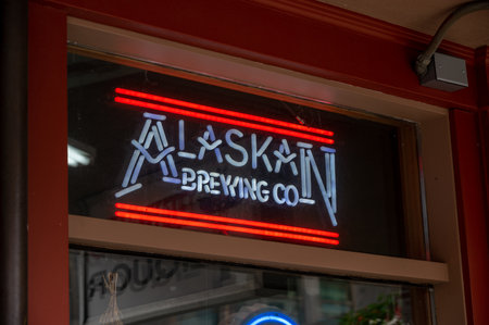 Juneau, Alaska - July 27, 2022: Central Juneau Alaska is home to many tourist shops, restaurants and landmarks. Alaskan Brewing Co sign visible.のeditorial素材