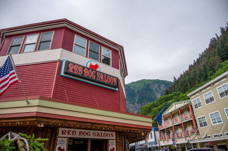 Juneau, Alaska - July 27, 2022: Central Juneau Alaska is home to many tourist shops, restaurants and landmarks. View of the Red Dog Saloon.のeditorial素材