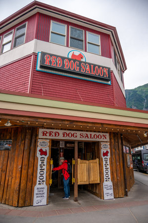 Juneau, Alaska - July 27, 2022: Central Juneau Alaska is home to many tourist shops, restaurants and landmarks. View of the Red Dog Saloon.のeditorial素材