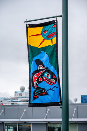 Juneau, Alaska - July 27, 2022: Native art banners on lamp posts along the Juneau ocean walk. .のeditorial素材