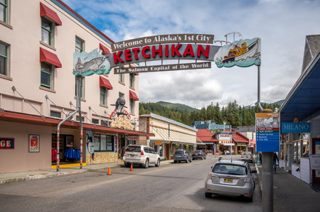 Ketchikan, Alaska - July 29, 2022: Views of the historic wooden buildings in the popular cruise destination of Ketchikan. Salmon Capital of the World Sign.のeditorial素材