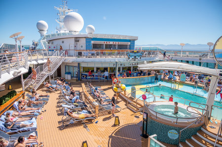 British Columbia - July 30, 2022:  Pool deck on the Serenade of th Seas.のeditorial素材