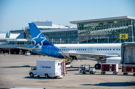 Vancouver, British Columbia - July 31, 2022: Air Transat jet on the tarmac of Vancouver's international airport.のeditorial素材