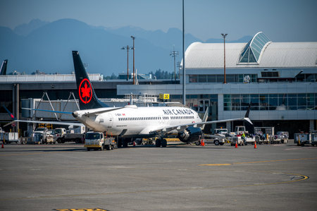 Vancouver, British Columbia - July 31, 2022: Air Canada aircraft on the tarmac of Vancouver's...
