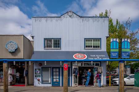 Vancouver, British Columbia - May 27, 2023: Views of Vancouver's landmark attraction - Granville Island Public Market, restaurants, and shops.のeditorial素材