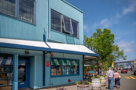 Vancouver, British Columbia - May 27, 2023: Views of Vancouver's landmark attraction - Granville Island Public Market, restaurants, and shops.のeditorial素材