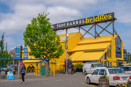 Vancouver, British Columbia - May 27, 2023: Views of Vancouver's landmark attraction - Granville Island Public Market, restaurants, and shops.のeditorial素材