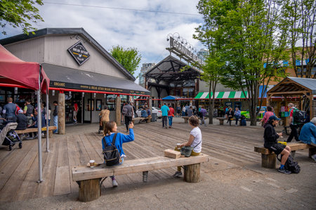 Vancouver, British Columbia - May 27, 2023: Views of Vancouver's landmark attraction - Granville Island Public Market, restaurants, and shops.のeditorial素材