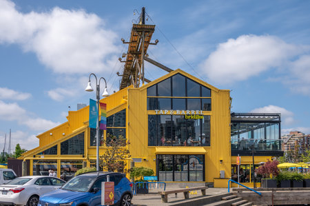 Vancouver, British Columbia - May 27, 2023: Views of Vancouver's landmark attraction - Granville Island Public Market, restaurants, and shops.のeditorial素材