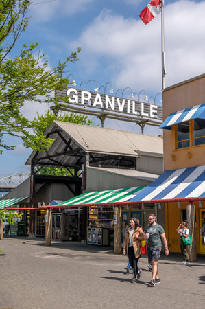 Vancouver, British Columbia - May 27, 2023: Views of Vancouver's landmark attraction - Granville Island Public Market, restaurants, and shops.のeditorial素材