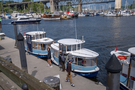 Vancouver, British Columbia - May 27, 2023: Views of Vancouver's landmark attraction - Granville Island Public Market, restaurants, and shops.のeditorial素材