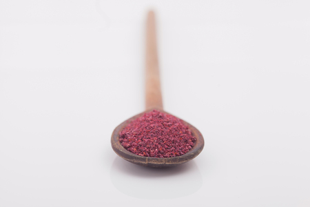 Sumac spice on white backgroundの写真素材