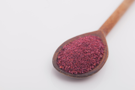 Sumac spice on white backgroundの写真素材