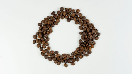 coffee beans on a white background. place for logo. Top view. Flat lay. Mockup