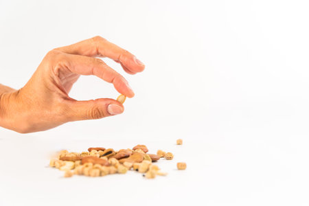 hand holding planet with rooted plant, for in garden, earth day conceptの写真素材