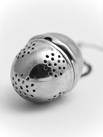 Tea ball on whiteの写真素材