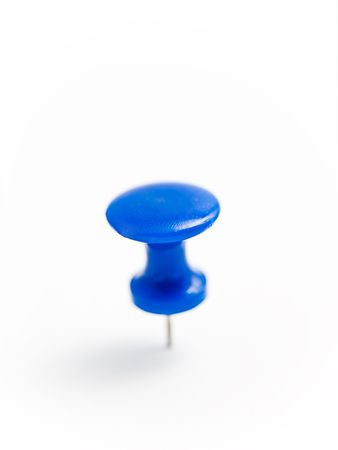 blue push pin on whiteの写真素材