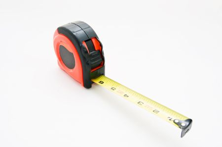 A tape measure extended showing the yellow tapeの写真素材