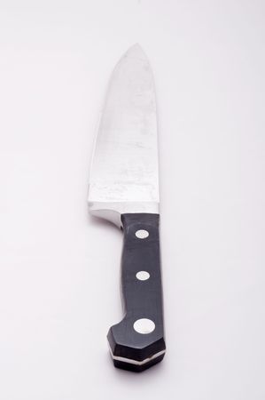 A very sharp horror movie knife sits on white with room for copy spaceの写真素材