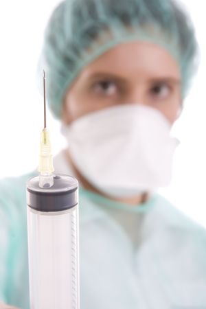 doctor holding syringe on white backgroundの写真素材