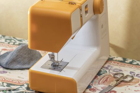 homemade sewing machine ready to manufacture and make clothes and arrangements at homeの写真素材