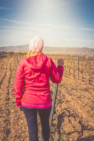 Woman with pink headscarf, enjoying and fighting cancer.の写真素材