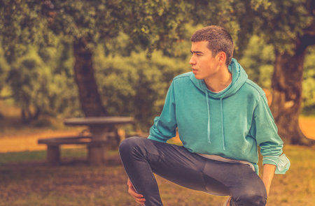 Young boy posing in mountain park