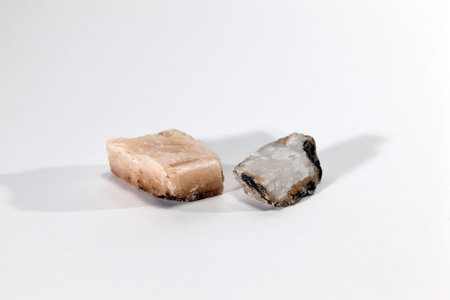 two mineral crystals of calcium carbonate, calcite, one pink and the other white. Spain