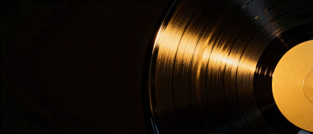 Vinyl record on black background, close-up, copy spaceの素材