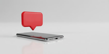 Mobile phone with red speech bubble on white background. 3D renderingの素材