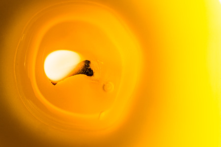 Citronella candle burning and photographed real close from the top.の写真素材