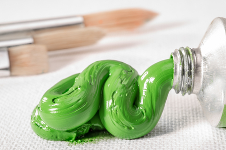 Permanent Green Light oil paint squeezed from the tube it was contained in, on to a white canvas.の写真素材