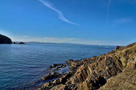 Nice panoramic view of the Mediterranean Sea in Collioure with the rocks in the first placeの写真素材
