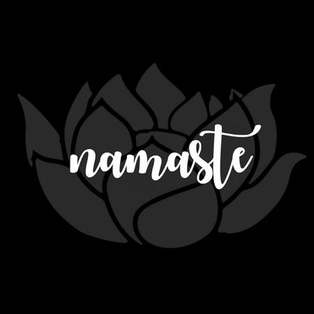 Mindful saying:  Namaste in white typography with lotus flower on black backgroundの写真素材