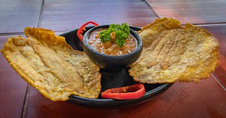 A sandwich sitting on top of a wooden tableの写真素材