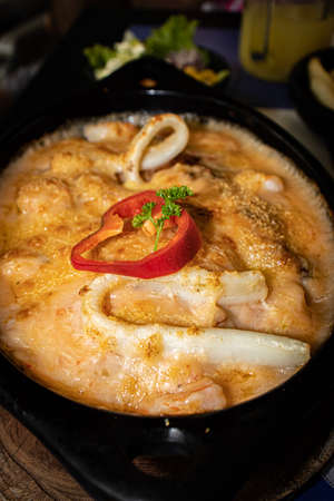 A pan of food on a tableの写真素材