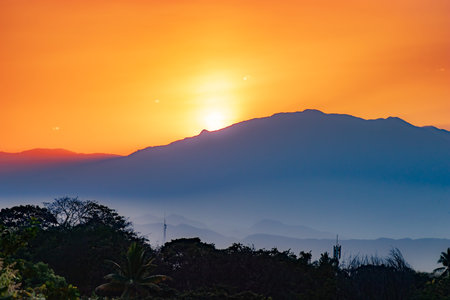 An orange sunset in the backgroundの写真素材