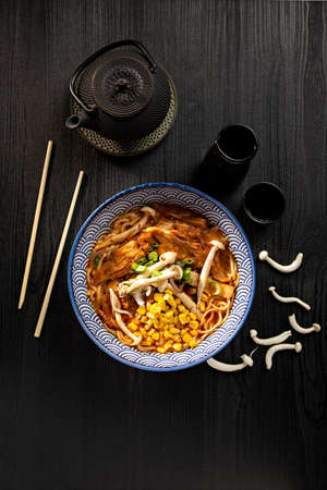 Japanese miso ramen soup on dark background viewed from above. Japanese noodles.の写真素材