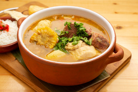 Sancocho is a traditional Venezuelan and Latin American soup or stew made with many types of beef, chicken with Yuca Plantain Potato Cassava and vegetables from the regionの写真素材