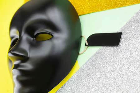 black carnival mask completely hiding the face for a woman or a manの写真素材