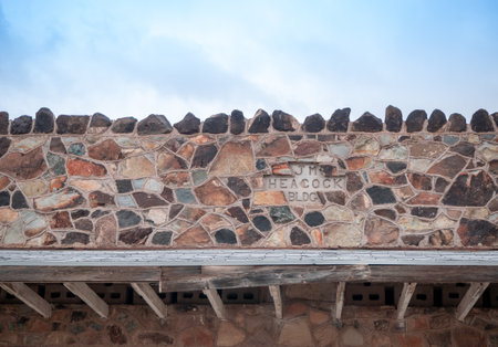 Upper front stone wall and roof line of historical building in Nevada, USAのeditorial素材