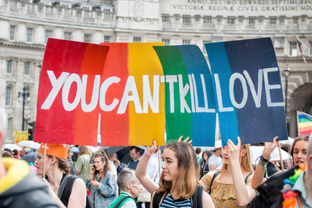 London, UK - June 25, 2016: LGBT Gay Pride Parade Sign 'You Can't Kill Love'のeditorial素材