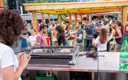 London, UK - August 28, 2016: People dancing at public outdoor street festival.