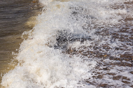 Water splashes on the surface of the river, close-upの写真素材