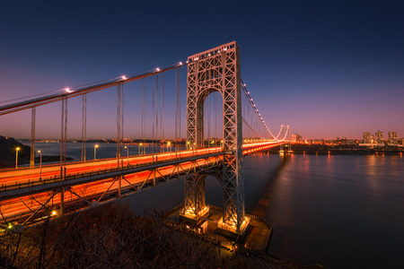 The George Washington Bridge spanning the Hudson River at twilight in New York City.の写真素材