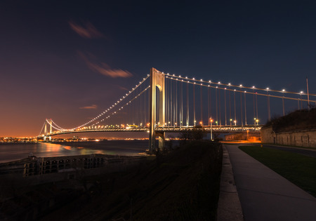 Verezano Bridge spanning the Hudson River at night in New York City.の写真素材