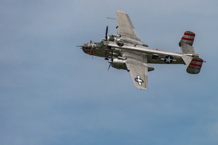 NEW WINDSOR, NY - SEPTEMBER 03, 2016: Panchito is a North American B-25 Mitchell from the Word War II Era flying over Stewart Airport at the New York Airshowのeditorial素材
