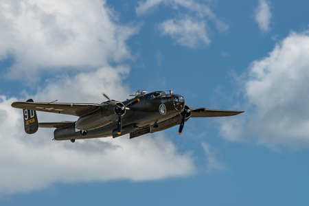 READING, PA - JUNE 3, 2017: North American
B-25J "Mitchell 'Briefing Time'in flight during World War II reenactment at Mid-Atlantic Air Museumのeditorial素材